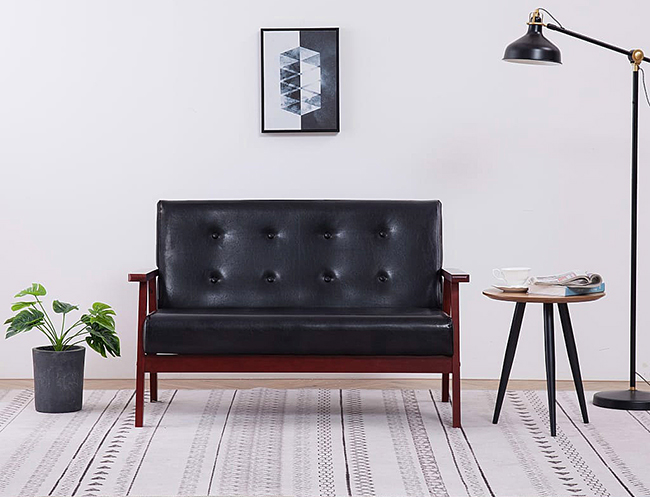 Czarna sofa retro Garner 2X tapicerowana